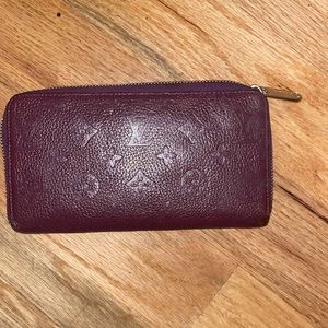 Louis Vuitton purple zip around wallet